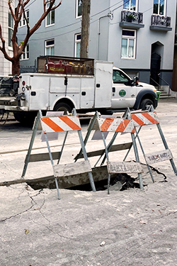 Sinkhole that formed in August on a Small Diameter Sewer Rehabilitation and Renewal (R & R) Program project on Page Street.