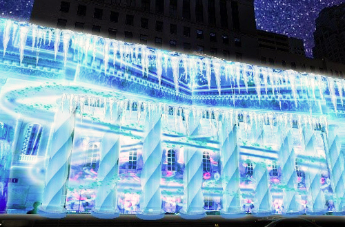 bright, winter ice themed image projected onto front of building