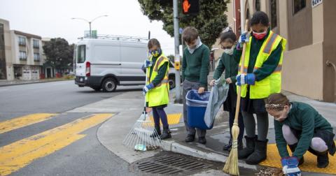 St. Johns Academy students clearing adopted drain
